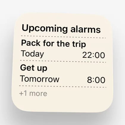 CAlarm's alarm widget on the Home Screen, showing Upcoming alarms with Pack for the trip Today at 22:00, Get up Tomorrow at 8:00, and +1 more